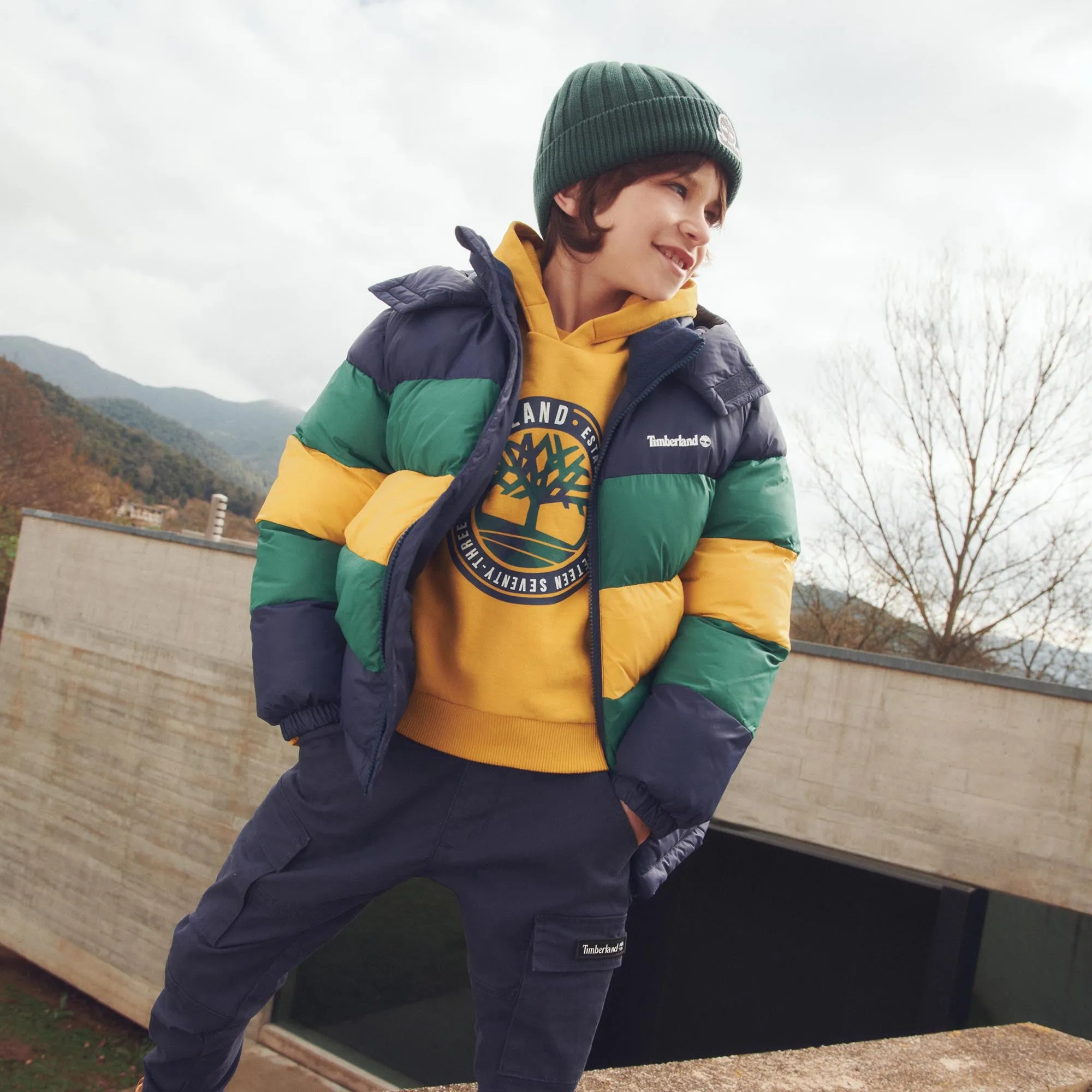 AW23 Timberland Boys Navy Blue, Green & Yellow Puffer Coat