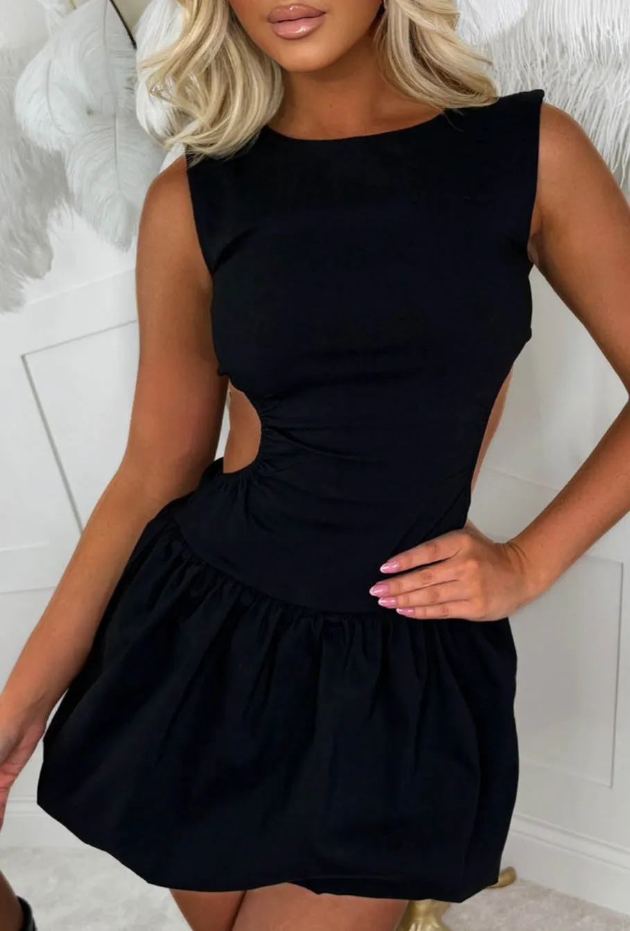 Chic & Trendy Black Stretch Cut Out Side Backless Puff Ball Mini Dress